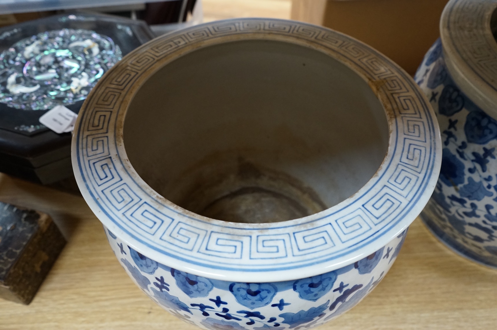 A pair of Chinese blue and white jardinieres, 30cm high